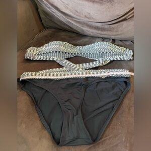 Skye 2 piece swim. Strapless top but there is a place to add strap. Size small